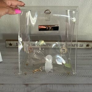 Brand new clear backpack with gold trim